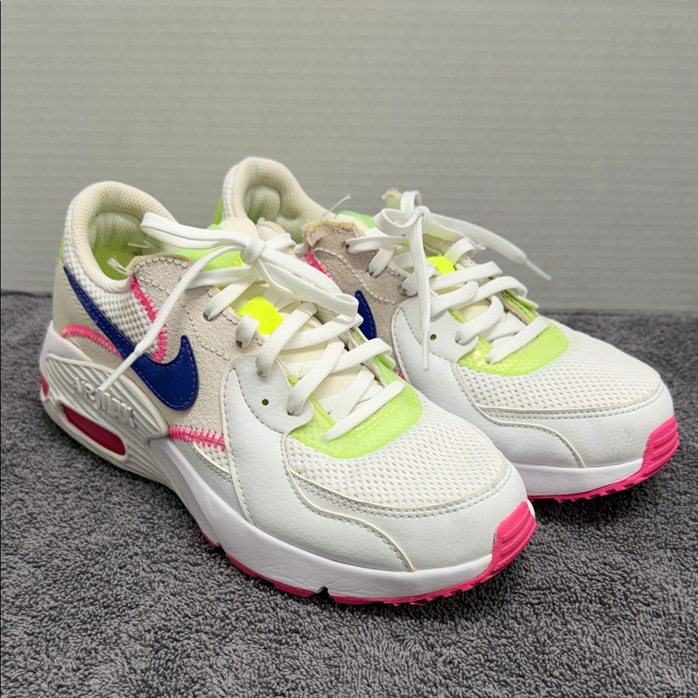 Nike Womens White, Pink, and Blue Sneakers